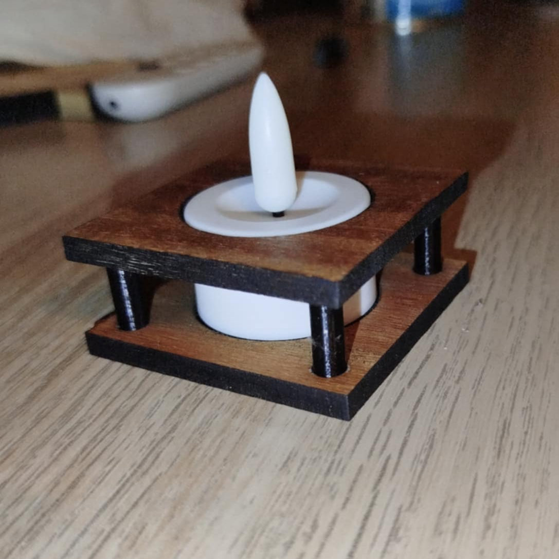 Telys holder