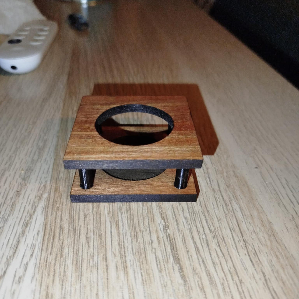 Telys holder
